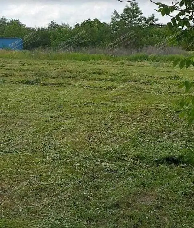 Ділянка з будинком під знос