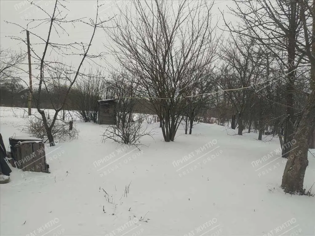 Ділянка з будинком під знос