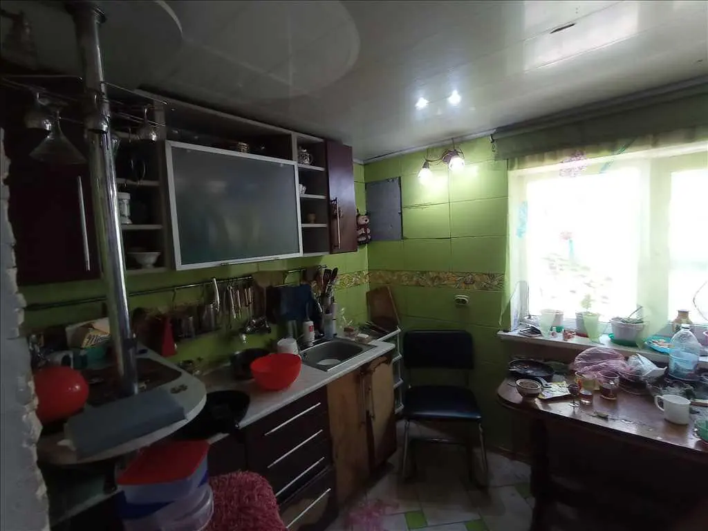 Двоповерховий будинок в районі Хрестовоздвиженського  монастиря