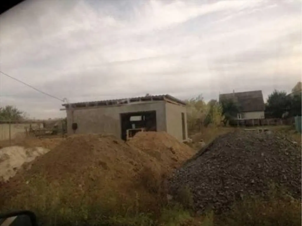 Земельна ділянка з проектом на будівництво житлового будинку