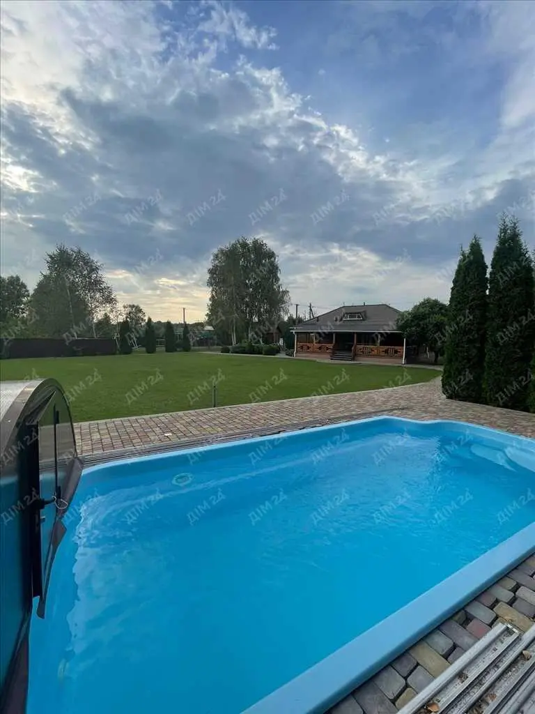 Унікальний будинок із зрубу в передмісті Полтави (Клюшники)