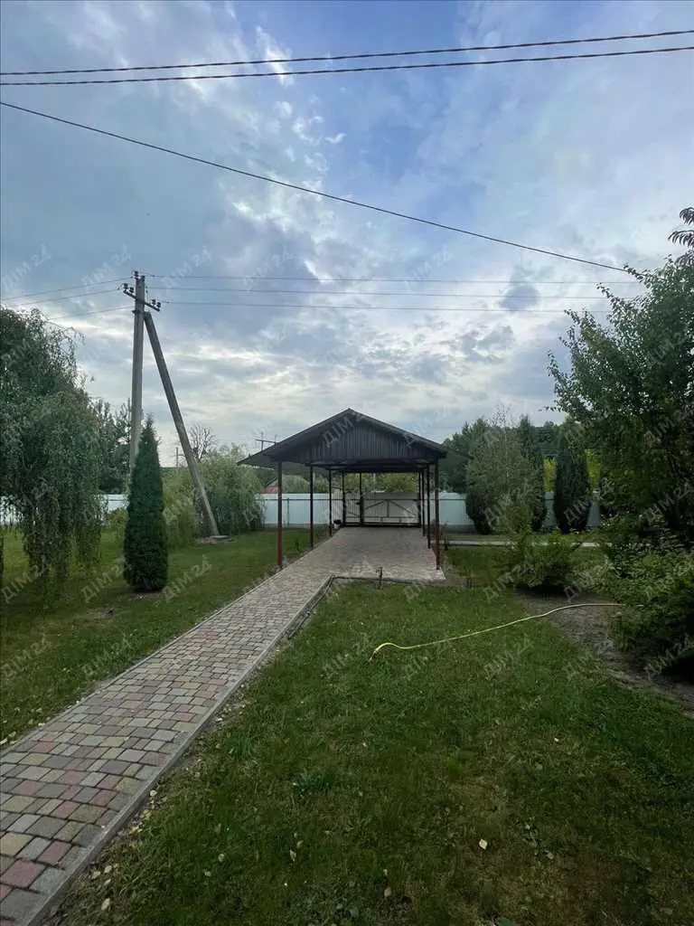 Унікальний будинок із зрубу в передмісті Полтави (Клюшники)