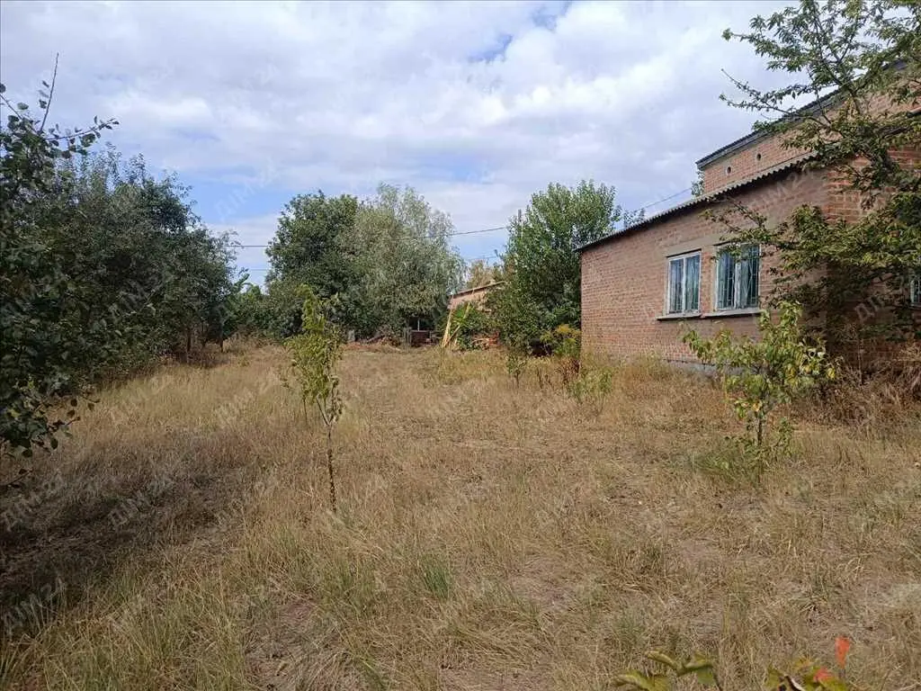 Цегляний будинок в Верхолах