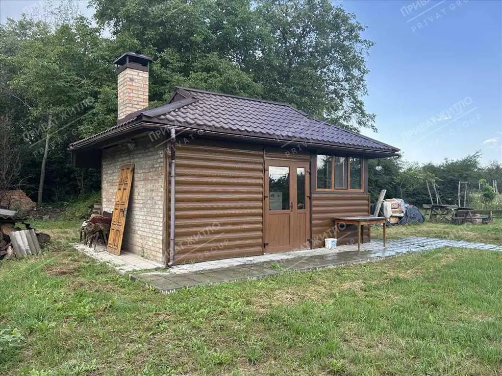 Затишний будинок з ділянкою в передмісті Полтави