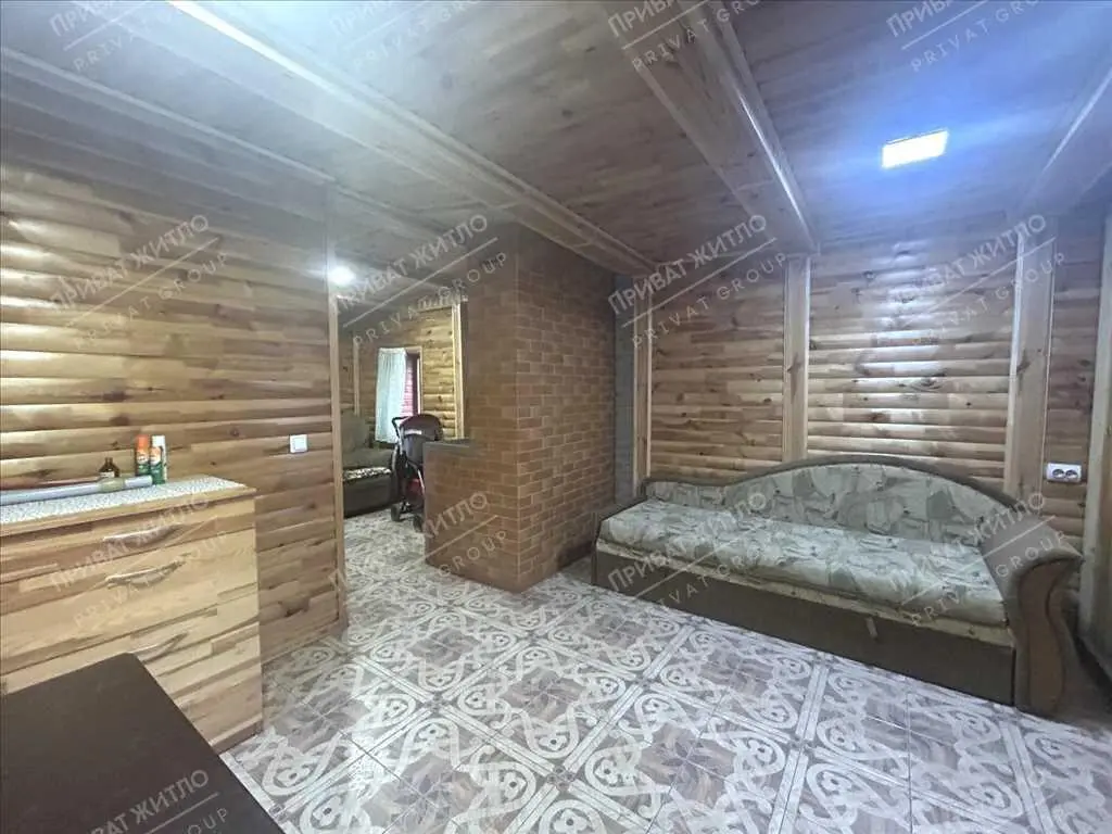 Затишний будинок з ділянкою в передмісті Полтави