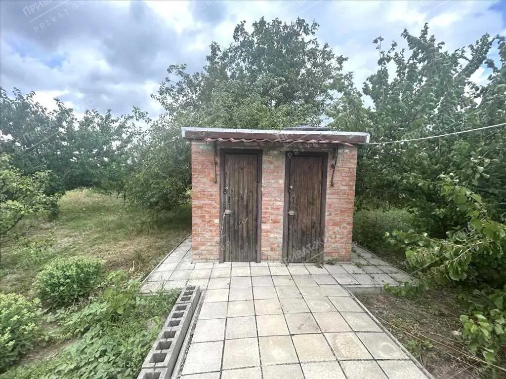 Затишний будинок з ділянкою в передмісті Полтави