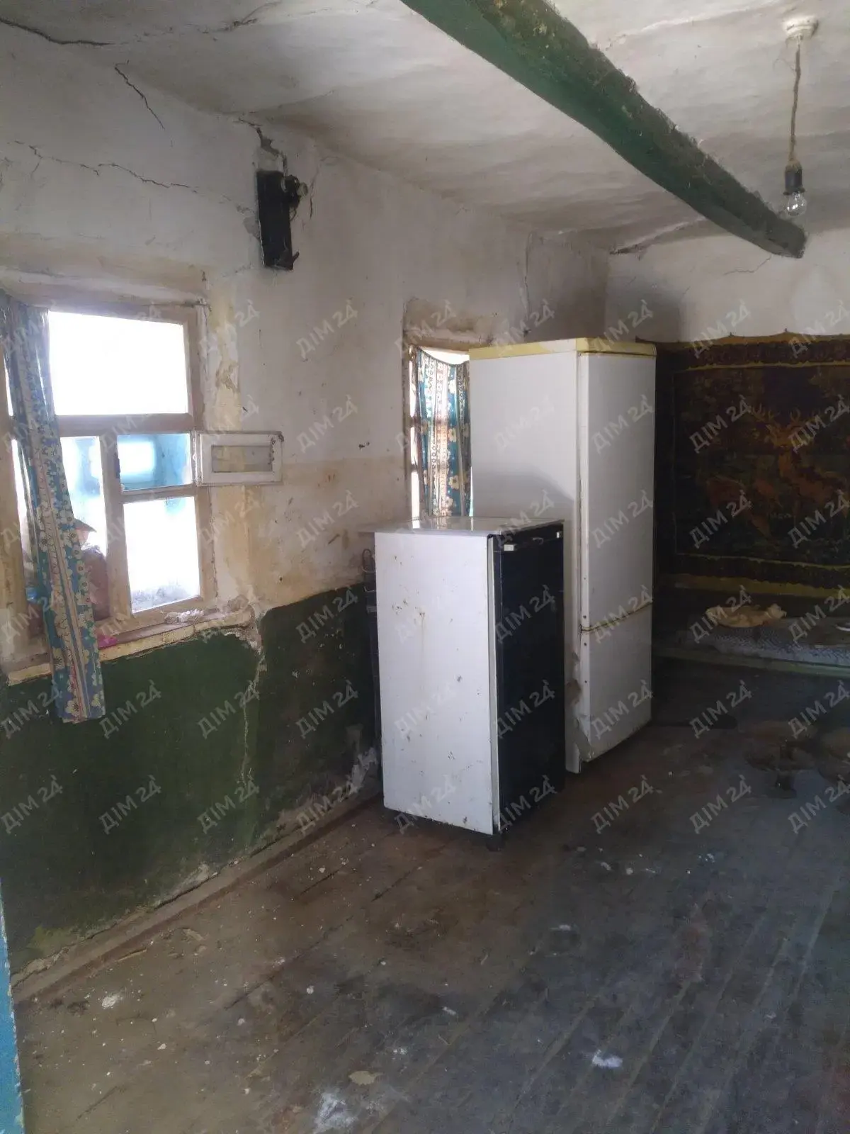 Продаж земельної ділянки з будинком у передмісті Полтави.