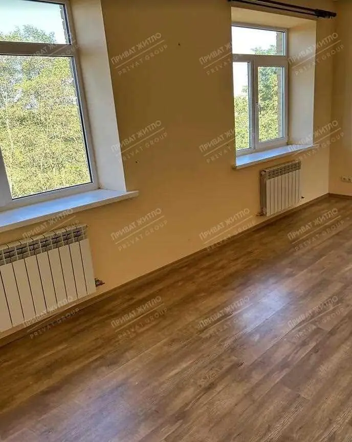 Розкішний двоповерховий цегляний будинок у с. Мильці