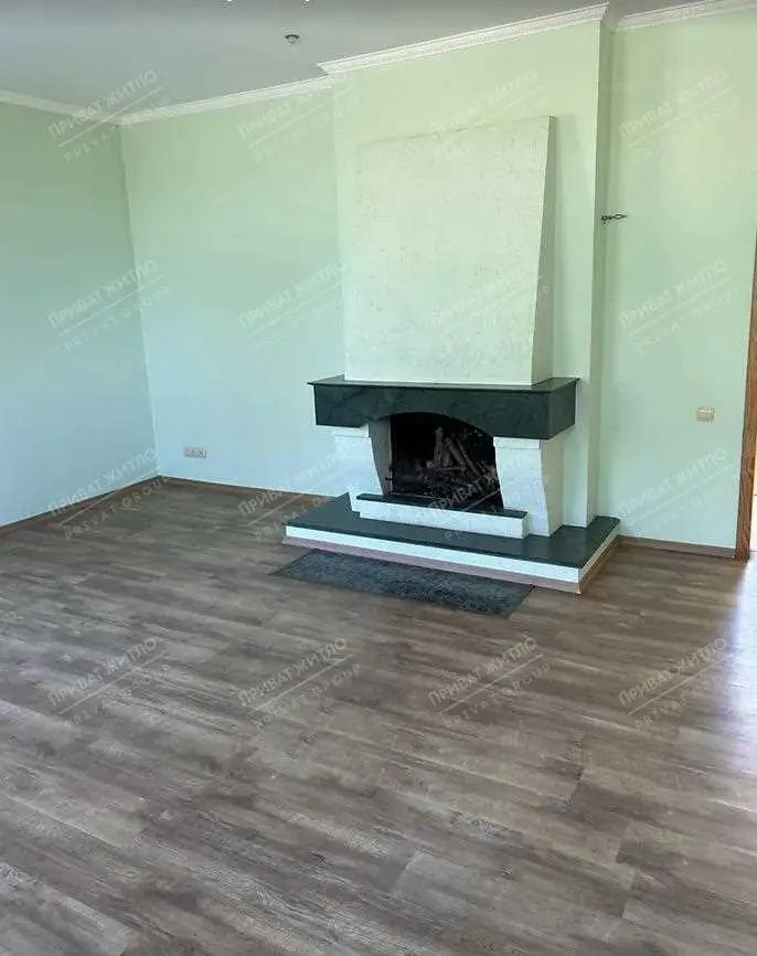 Розкішний двоповерховий цегляний будинок у с. Мильці